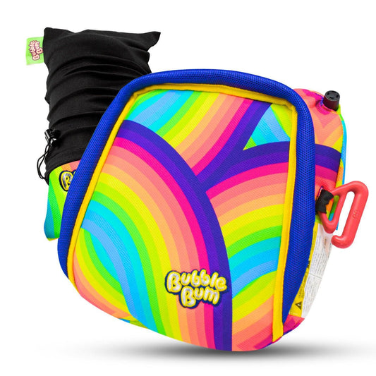 A multicolored BubbleBum inflatable car booster seat with a rainbow style design, folded up with a black carrying case.