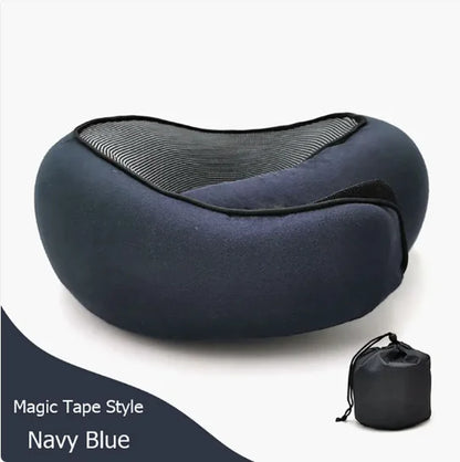 Navy blue Magic Tape style travel neck pillow with storage bag.