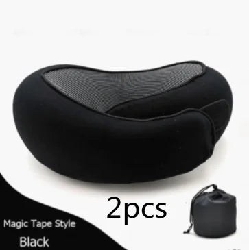 Black buckle-style travel neck pillow with storage bag.