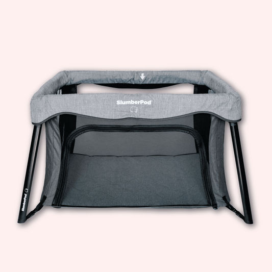 Gray SlumberPod baby crib on a white background